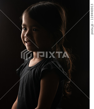 Captivating Portrait of a Young Girl Captured in Soft, Gentle Lighting Effects Captivating Portrait of a Young Girl Captured in Soft, Gentle Lighting Effects 119448913