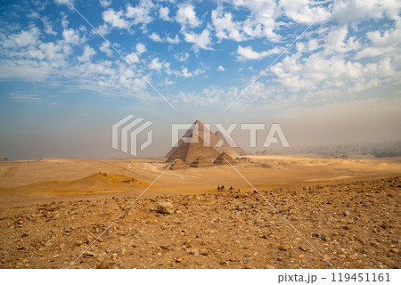 Egypt. Cairo - Giza. General view of pyramids from the Giza Plateau (three pyramids known as Queens' Pyramids on front side; next in order from left: the Pyramid of Menkaure, Khafre and Chufu 119451161