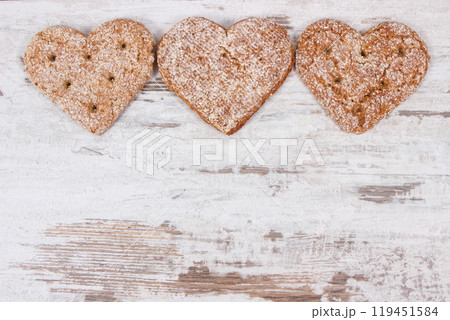 Fresh homemade wholegrain bread in shape of heart for breakfast Fresh homemade wholegrain bread in shape of heart for breakfast 119451584