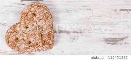Fresh homemade wholegrain bread in shape of heart for breakfast Fresh homemade wholegrain bread in shape of heart for breakfast 119451585