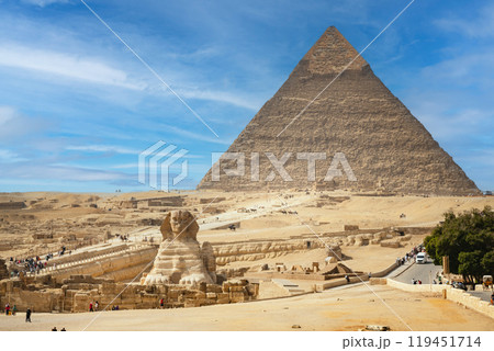 The Sphinx and Pyramid against the background of a beautiful blue sky ,Cairo,Egypt The Sphinx and Pyramid against the background of a beautiful blue sky ,Cairo,Egypt 119451714