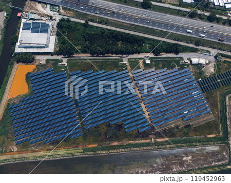 Ecology solar power station panels in the fields green energy . Aerial view of Solar panel, photovoltaic, alternative electricity source. Concept of sustainable resources. 119452963