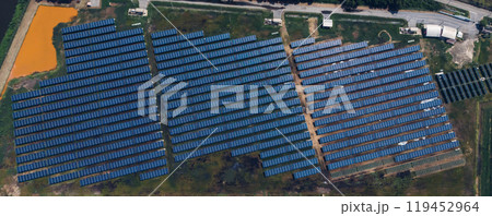 Ecology solar power station panels in the fields green energy . Aerial view of Solar panel, photovoltaic, alternative electricity source. Concept of sustainable resources. Ecology solar power station panels in the fields green energy . Aerial view of Solar panel, photovoltaic, alternative electricity source. Concept of sustainable resources. 119452964
