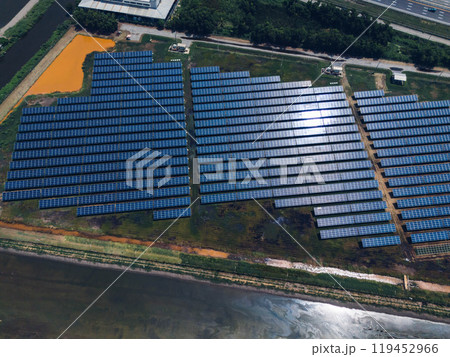 Ecology solar power station panels in the fields green energy . Aerial view of Solar panel, photovoltaic, alternative electricity source. Concept of sustainable resources. 119452966