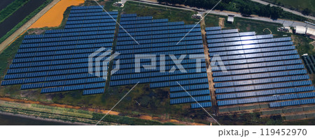 Ecology solar power station panels in the fields green energy . Aerial view of Solar panel, photovoltaic, alternative electricity source. Concept of sustainable resources. Ecology solar power station panels in the fields green energy . Aerial view of Solar panel, photovoltaic, alternative electricity source. Concept of sustainable resources. 119452970