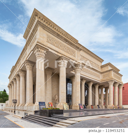 The Ganja State Drama Theater in Azerbaijan, characterized by its classical architecture, set against a clear blue sky The Ganja State Drama Theater in Azerbaijan, characterized by its classical architecture, set against a clear blue sky 119453251