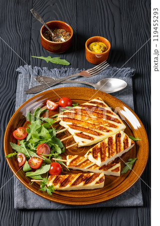 Grilled Greek Halloumi Cheese on sticks, top view 119455293