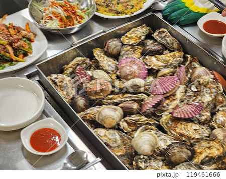 Korean Seafood Food. Steamed oysters and clams Korean Seafood Food. Steamed oysters and clams 119461666