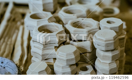 carving element. furniture in classic style. white color wood with gold trim. patina. carving. small depth of field. luxury furniture. use as background. 119462596