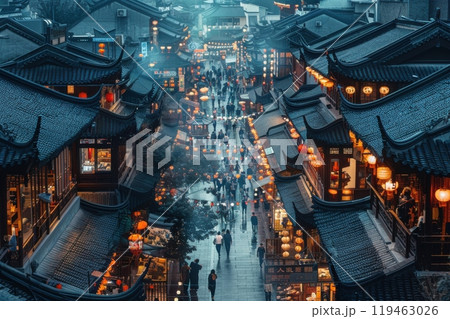 A city street at night with many lanterns and signs A city street at night with many lanterns and signs 119463026