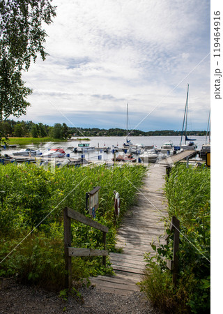 Boats in marina in Sweden. yachts, sailboats, dinghies in marina. Boats in marina in Sweden. yachts, sailboats, dinghies in marina. 119464916