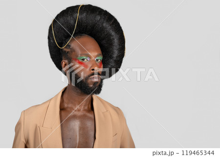 Confident African American gay model wearing huge Confident African American gay model wearing huge 119465344
