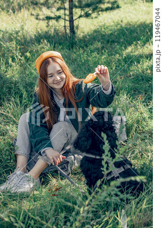 harmonious bond between humans, pets, and nature, promoting mental well-being and stress relief through outdoor activities 119467044