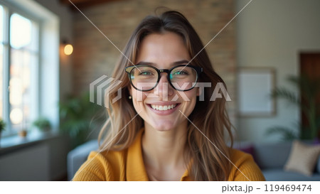 Beautiful positive young woman girl eyewear call webcam  119469474