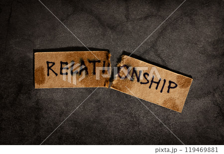 Sadness Love, Ending of Relationship Concept, Ripped Paper with Relationship Word. Seperated of Couple or Marriage Sadness Love, Ending of Relationship Concept, Ripped Paper with Relationship Word. Seperated of Couple or Marriage 119469881