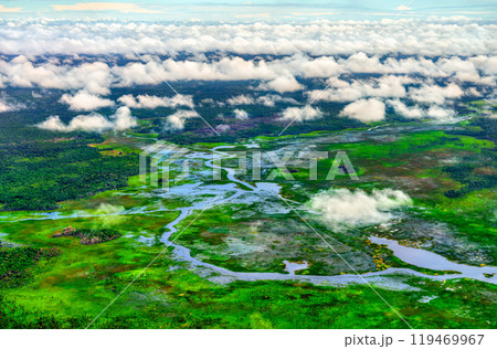 Breathtaking Aerial View of the Boerasirie River Meandering Through the Amazon Rainforest in Guyana, South America Breathtaking Aerial View of the Boerasirie River Meandering Through the Amazon Rainforest in Guyana, South America 119469967