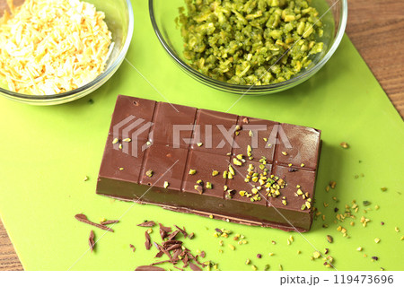 Dubai chocolate with pistachio paste and kataifi dough. Confectionery food and sweets with your own hands at home in the kitchen. 119473696