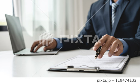 Business man employer holding resume hiring recruit looking cv resume to hire candidates, analyzing information before job interview. Recruitment concepts 119474132