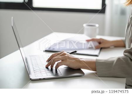 Business woman employer holding resume hiring recruit looking cv resume to hire candidates, analyzing information before job interview. Recruitment concepts Business woman employer holding resume hiring recruit looking cv resume to hire candidates, analyzing information before job interview. Recruitment concepts 119474575