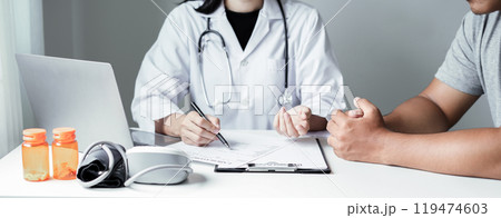 Female doctors who treat patients make an appointment to listen to the results after a physical examination and explain medical information and diagnose the disease. Medical concepts and good health 119474603