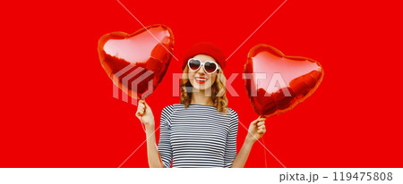 Summer, holiday, celebration, happy cheerful young woman laughing with red heart shaped balloons Summer, holiday, celebration, happy cheerful young woman laughing with red heart shaped balloons 119475808