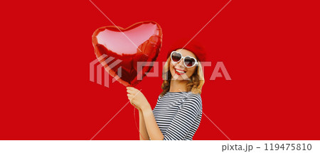 Summer, holiday, celebration, happy cheerful young woman laughing with red heart shaped balloons 119475810