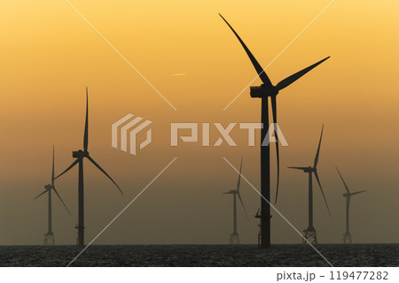 Sunset view of the Offshore wind power systems off the western coast of Taiwan. Offshore wind power systems, Taiwan. 119477282