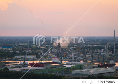 Wonderful view of industrial and port area of Ravenna at sunset Wonderful view of industrial and port area of Ravenna at sunset 119479605