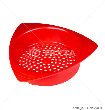 Small red plastic colander. Colander front view of modern plastic strainer isolated on white Small red plastic colander. Colander front view of modern plastic strainer isolated on white 119479891