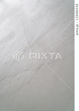 Closeup background of decorative plaster surface 119480548