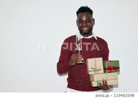 Celebrating with Gifts and a Glass of Bubbly 119482096