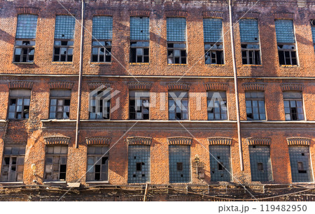 industrial background, facade of abandoned vintage factory building industrial background, facade of abandoned vintage factory building 119482950