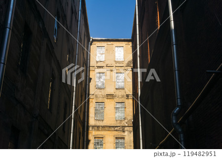 industrial architectural background, vintage buildings of an old factory workshops industrial architectural background, vintage buildings of an old factory workshops 119482951