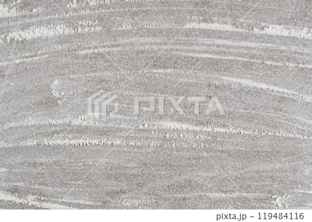 Grey cooking background of spilled wheat flour on stone background, top view. 119484116