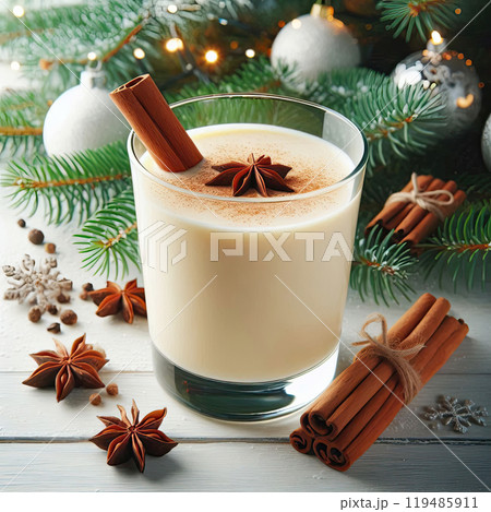 Christmas drink with cinnamon sticks and anise stars, glass of sweet classic eggnog cocktail decorated background with fir tree and baubles Christmas drink with cinnamon sticks and anise stars, glass of sweet classic eggnog cocktail decorated background with fir tree and baubles 119485911