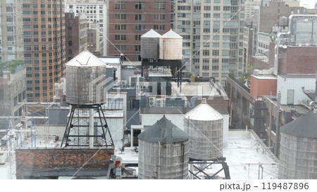 New York City Manhattan cityscape. Rooftop water towers, residential district buildings roof tanks. New York City Manhattan cityscape. Rooftop water towers, residential district buildings roof tanks. 119487896