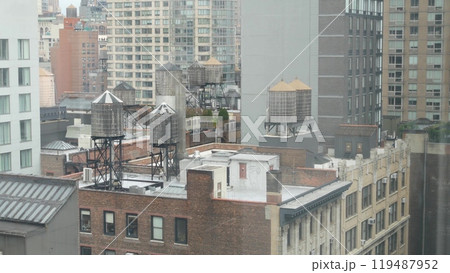 New York City Manhattan cityscape. Rooftop water towers, residential district buildings roof tanks. 119487952