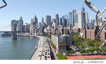 Brooklyn Bridge from Manhattan Bridge. New York City downtown skyline, financial district cityscape. 119488130