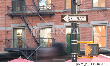 New York City street crossroad, yellow traffic light, transport road intersection, United States. 119488138