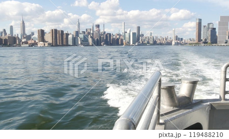 New York City skyline from ferry boat. Manhattan midtown, Empire State, Chrysler Building, USA. New York City skyline from ferry boat. Manhattan midtown, Empire State, Chrysler Building, USA. 119488210
