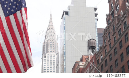 New York, american flag waving. Chrysler building. Manhattan midtown city street banner, patriotism. 119488275