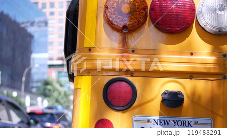 Yellow School Bus on New York Manhattan street, schoolbus truck on USA city road. Children education Yellow School Bus on New York Manhattan street, schoolbus truck on USA city road. Children education 119488291