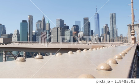 Brooklyn Bridge to Manhattan downtown. New York City skyline cityscape. World Trade Center, USA. Brooklyn Bridge to Manhattan downtown. New York City skyline cityscape. World Trade Center, USA. 119488303