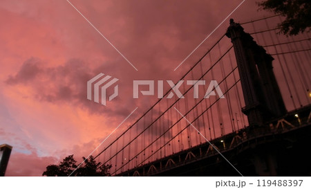 Manhattan Bridge to Brooklyn Dumbo. New York City symbol, USA. Evening sunset cloudy sky before rain 119488397