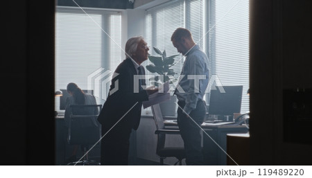 Senior team leader with papers loses temper and yells at male company employee Senior team leader with papers loses temper and yells at male company employee 119489220