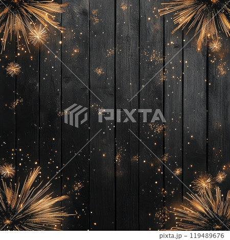 Sparks flying across a wooden surface during a celebration at night with a dark background 119489676