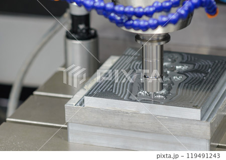 The CNC milling machine cutting mold part by solid ball end mill tool. The CNC milling machine cutting mold part by solid ball end mill tool. 119491243