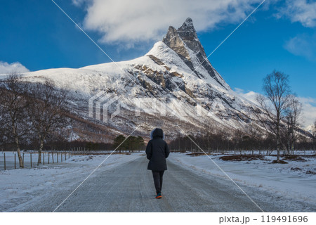 Tromso Norway woman tourist with winter nature landscape at Otertinden mountain in Signaldalen 119491696