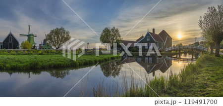 Dutch Windmill and traditional house panorama sunrise at Zaanse Schans Village, Amsterdam Netherlands 119491700