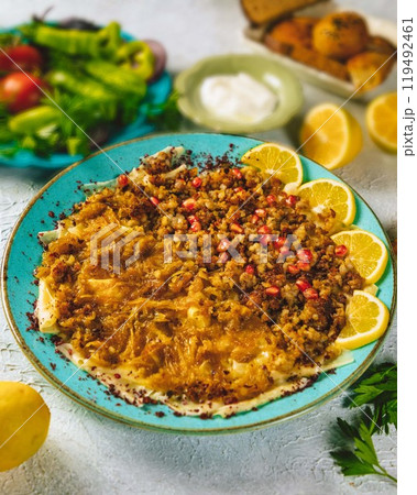 Delicious turkish food kayseri yaglasi corbasi serving on a blue plate 119492461